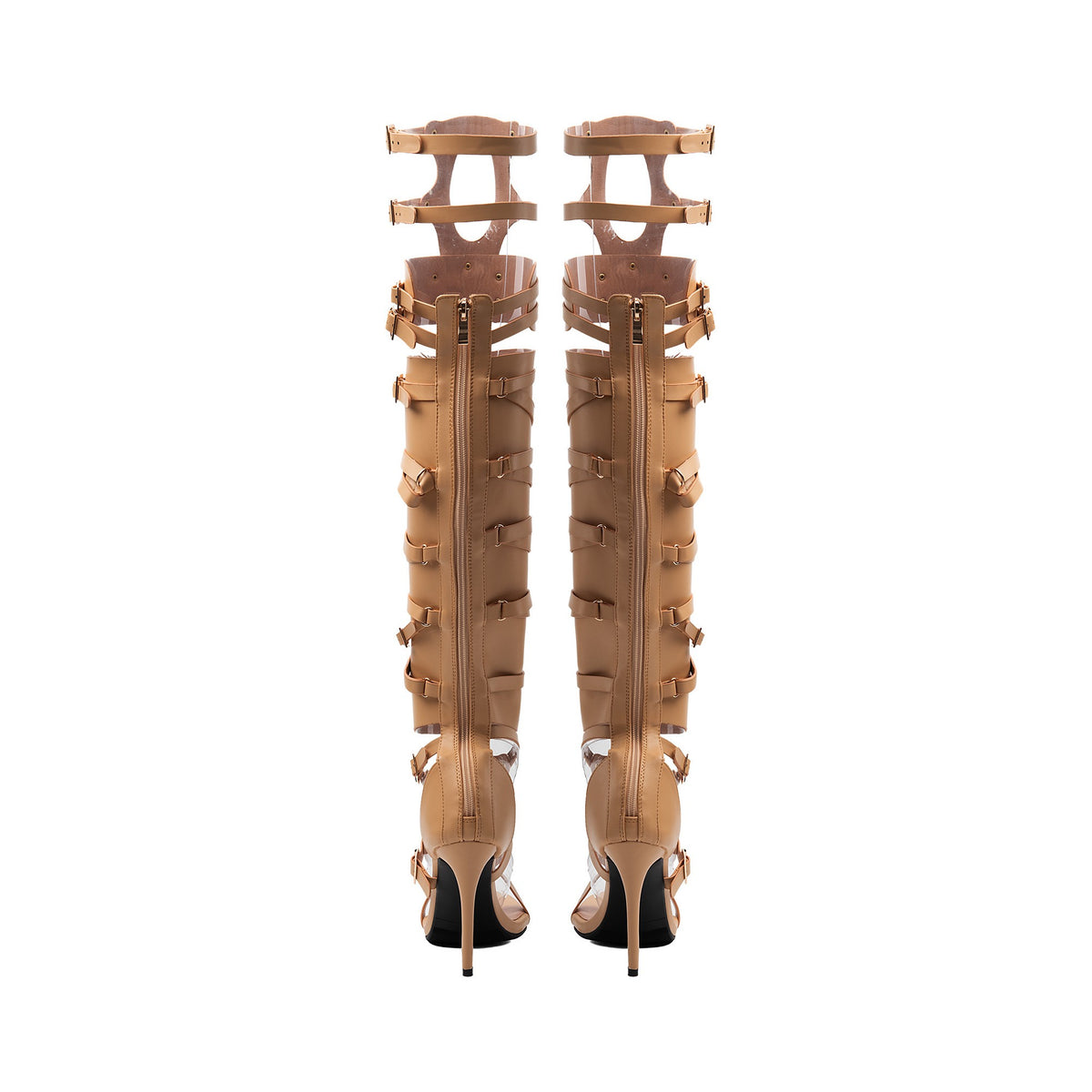 nude strappy gladiator boots showing full-length back zippers and stiletto heels.