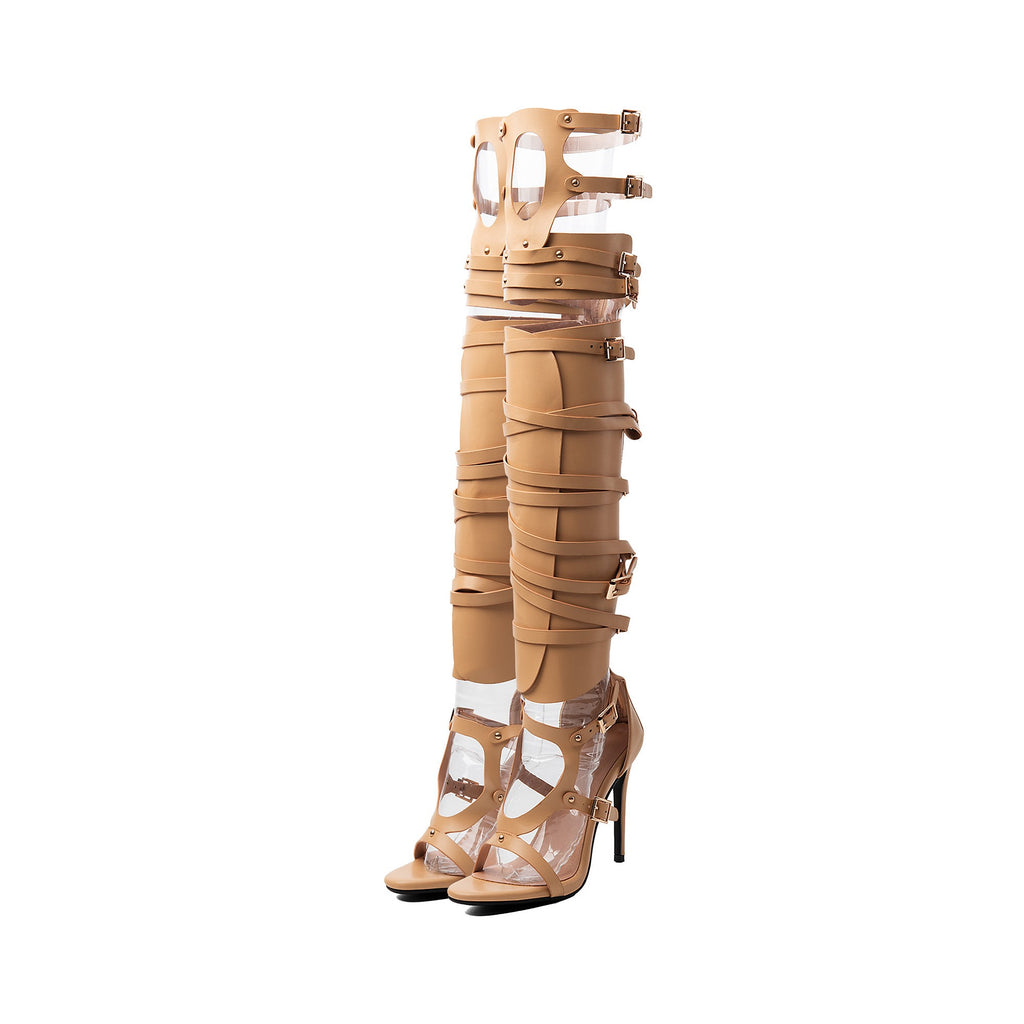 Pair of women's beige cutout strappy gladiator high heel thigh-high boots