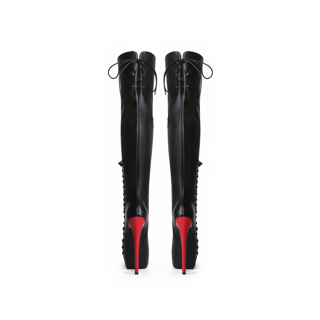 Back view of black over-the-knee boots showing vibrant red stiletto heels and rear thigh ties